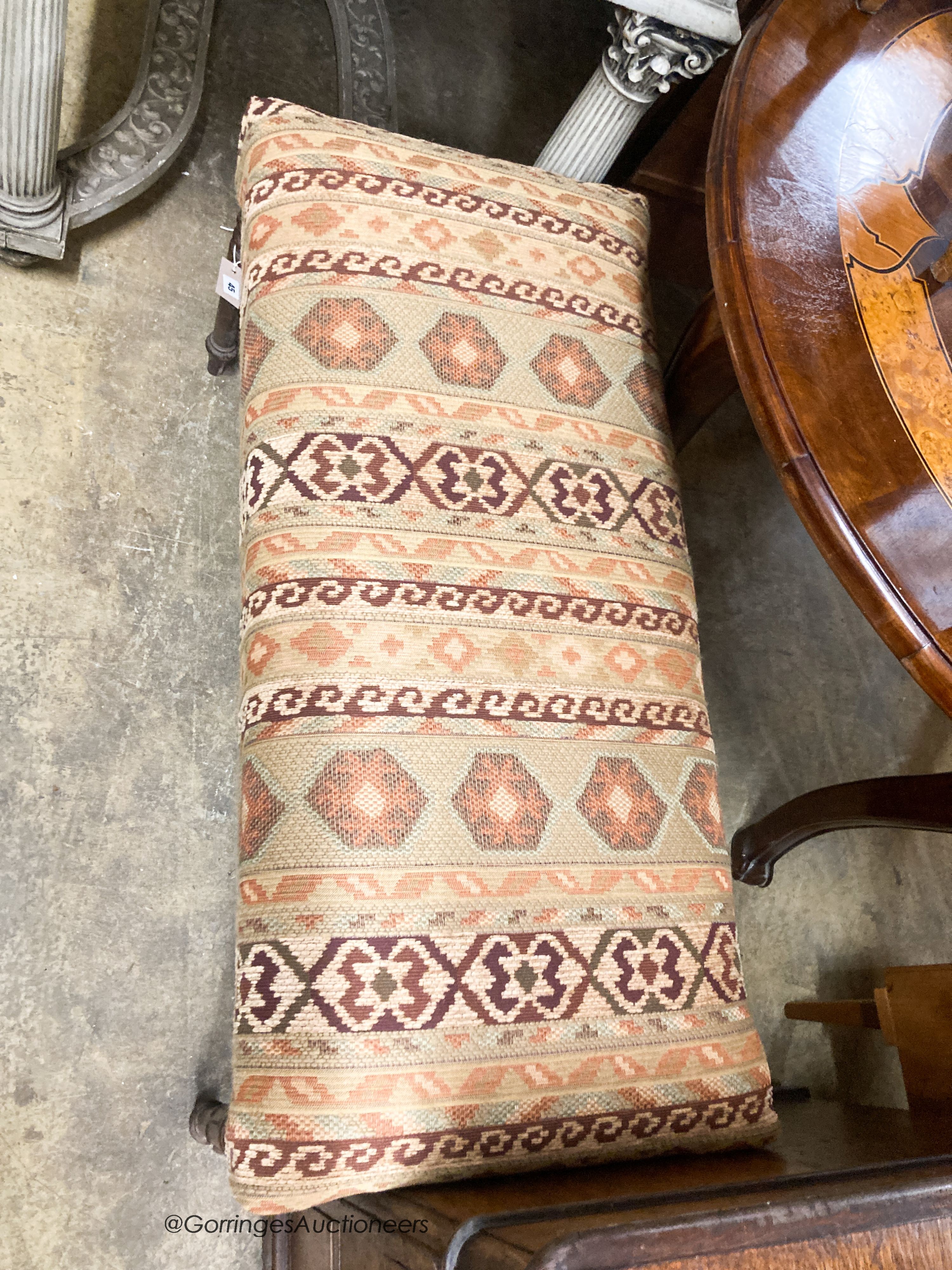 A William IV mahogany window seat, with kelim upholstery, W.104cm D.48cm H.48cm
